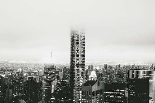 high rise grayscale photo of cityscape town